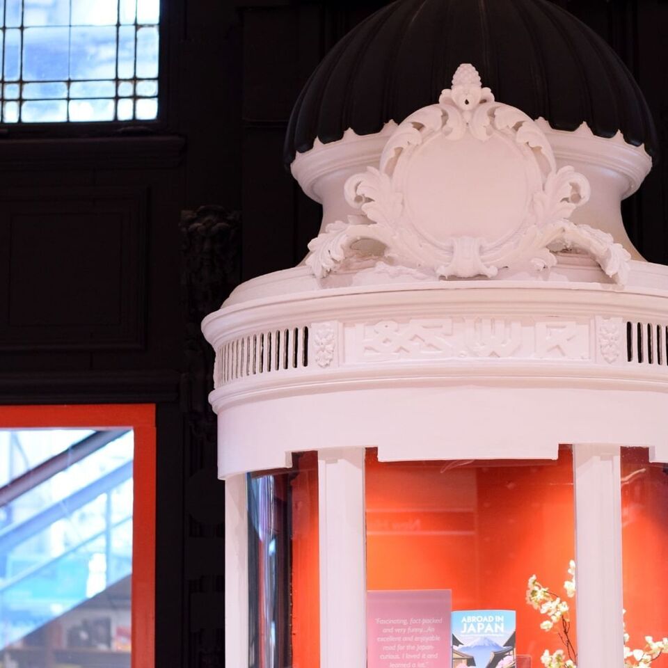 detail on the victorian ticket booths, painted in white, at foyles waterloo station