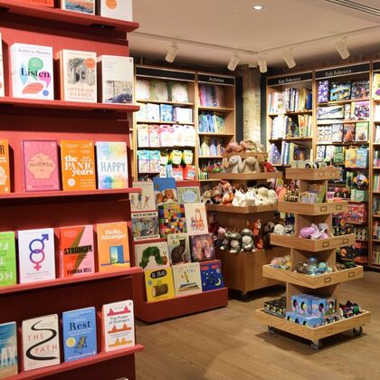 shelves of children's books and gifts at foyles bookshop in waterloo station