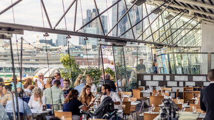 diners in the oxo tower restaurant view through windows