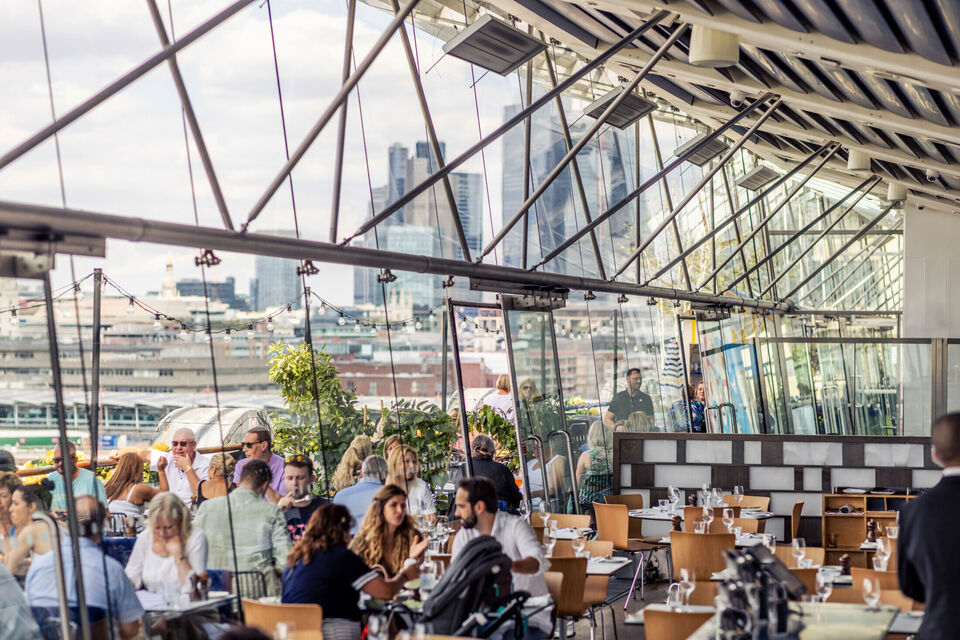 diners in the oxo tower restaurant view through windows