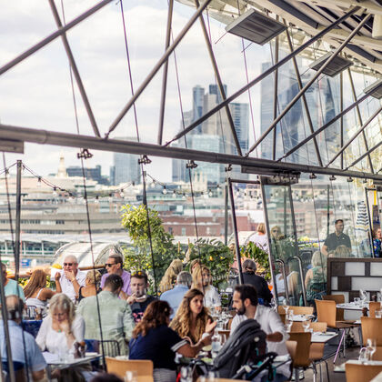 diners in the oxo tower restaurant view through windows