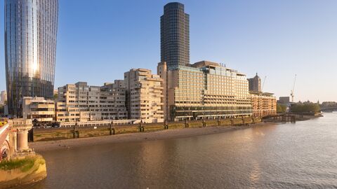 Panorama view of river thames and south bank at low tide, on the left blackfriars bridge, in the middle sea containers hotel and on the right oxo tower